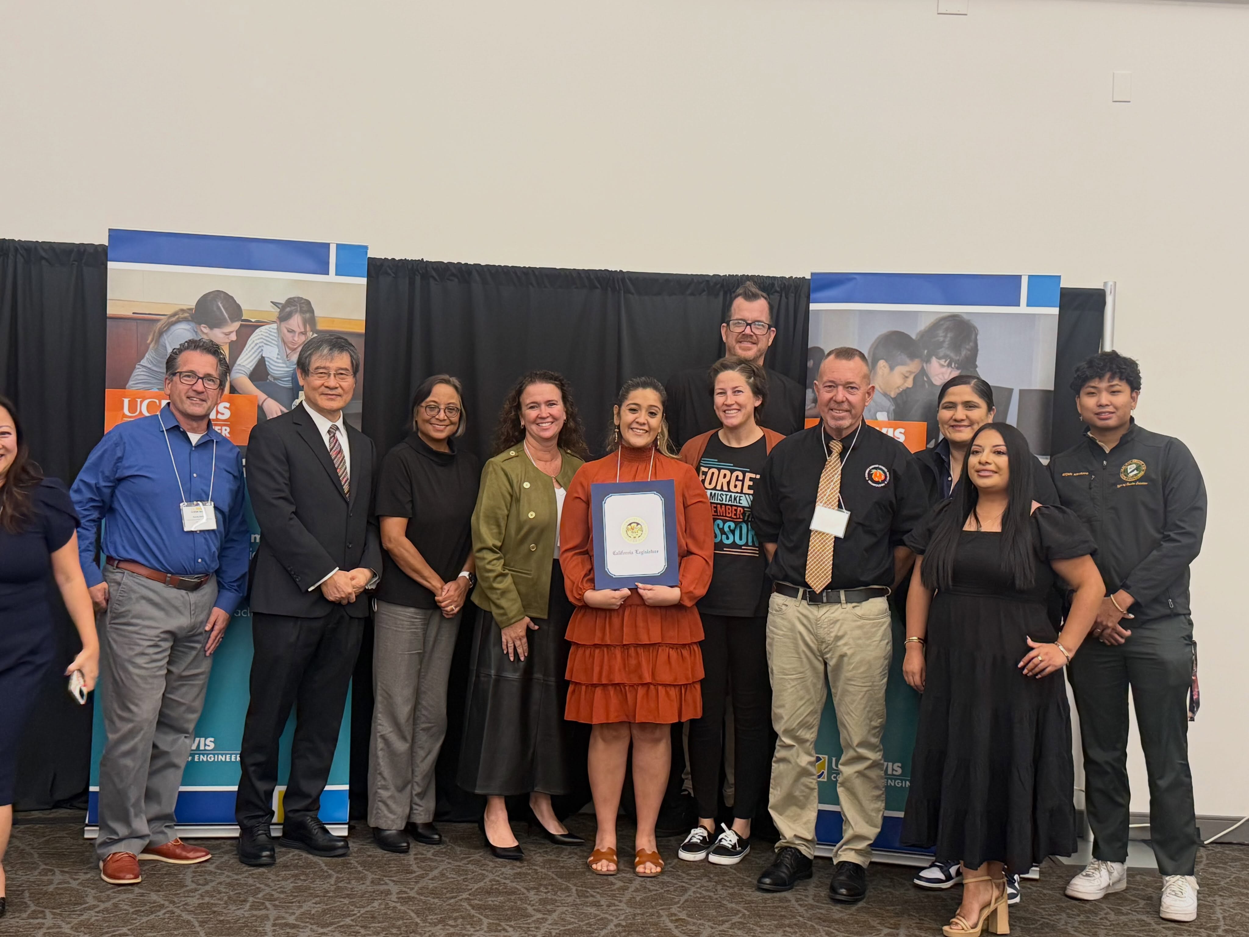 Group photograph at the C-STEM conference shared by McPherson to celebrate its two Teachers of the Year